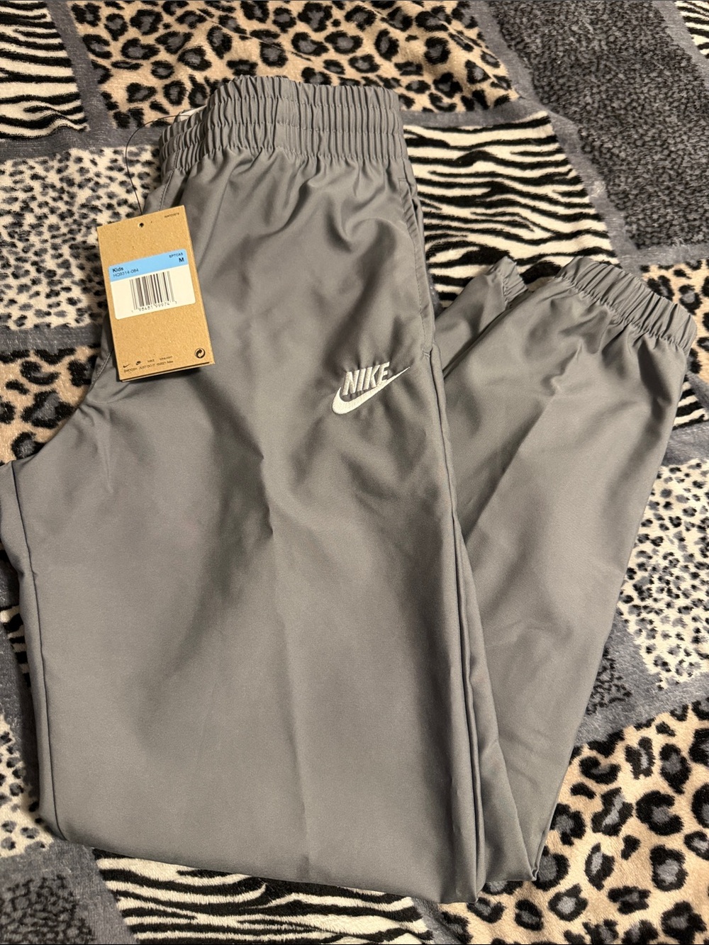 Nike Kids Gray Joggers with White Swoosh